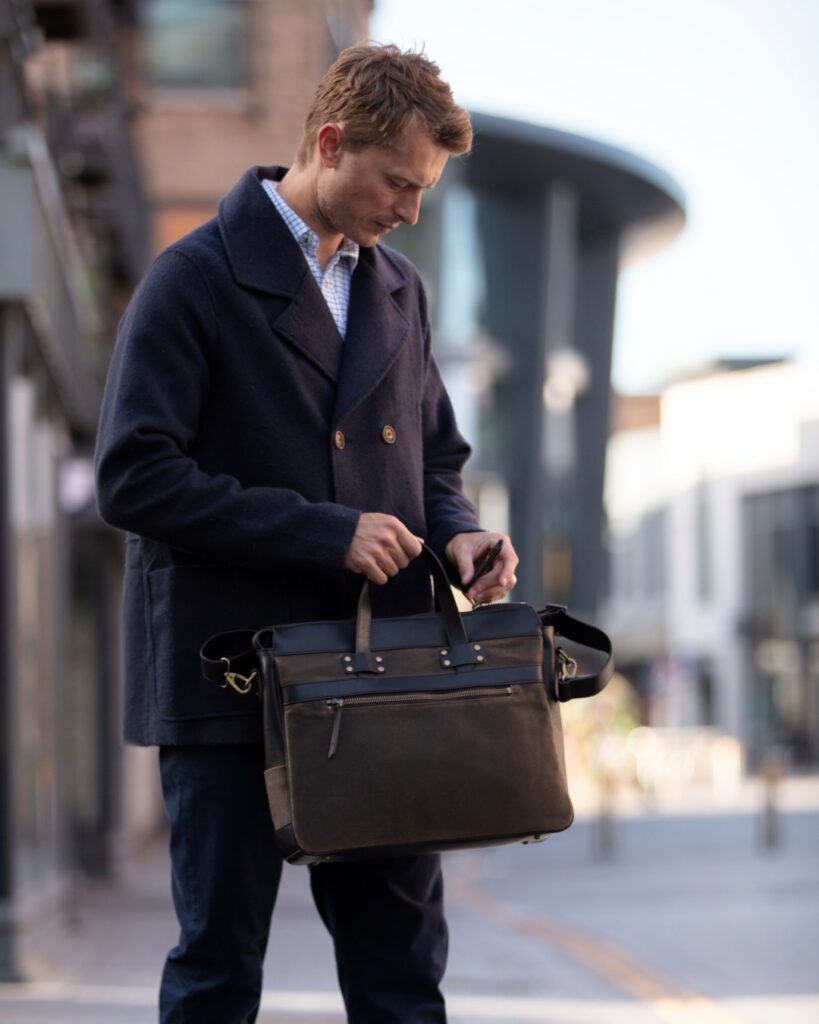 Builford 628 Portfolio waxed canvas briefcase with navy wool coat for professional office style